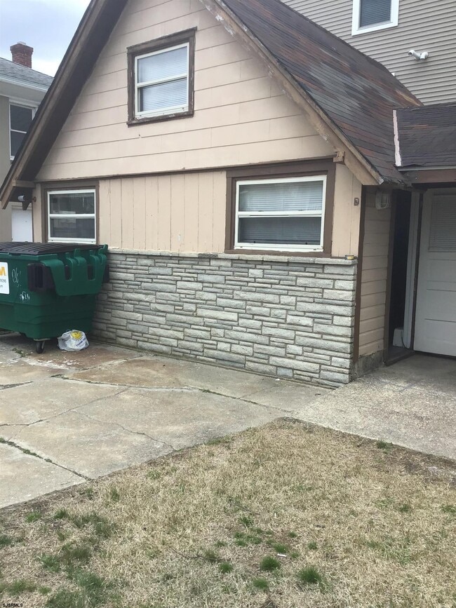 Building Photo - 9317 Monmouth Ave Unit D