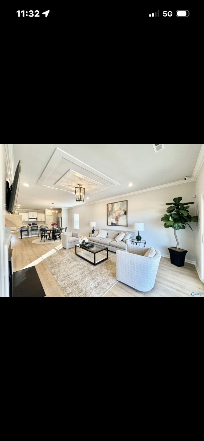 Photo - "NEWLY BUILT- Spacious 4-Bedroom Haven with Granite Elegance and Cozy Fireplace in Harvest"
