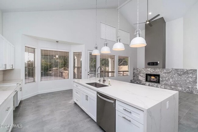 Kitchen and living room - 6739 E Gelding Dr