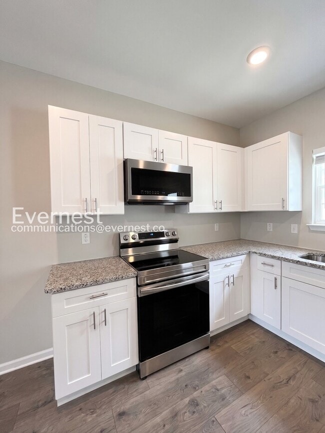 Photo - 2-Bed/3-Bath Townhouse with Modern Amenities/ Pet-Friendly /Available Now!