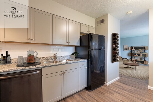 Photo - Courtyard Off the Square Apartments