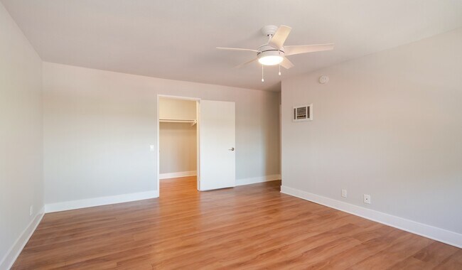 Relax and unwind in your private bedroom equipped with ceiling fan