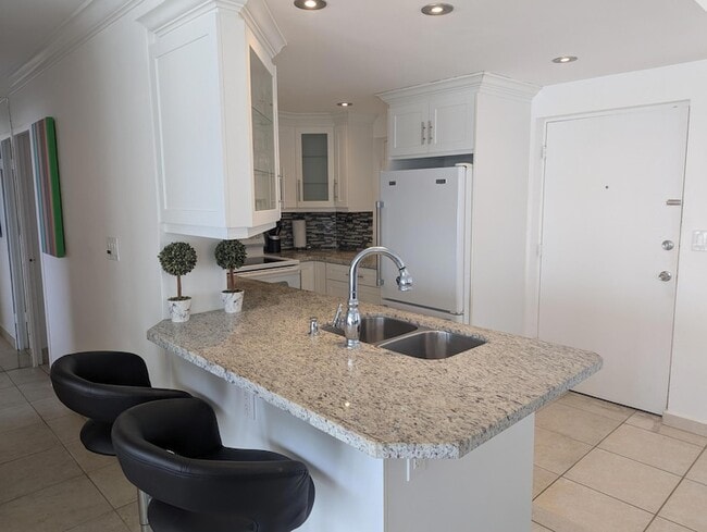 Photo - 220 Kings Point Dr Unit 501
