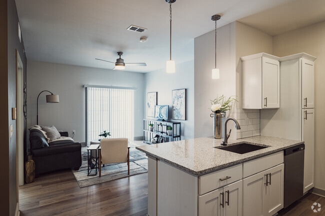 2BR, 2BA - 1203SF - Kitchen and Living Area - Midtown Apartments