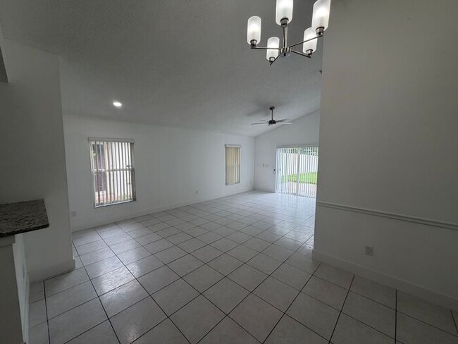 3 Bedroom, 2 Bathroom East Orlando Home with Garage & Large Fenced Backyard!