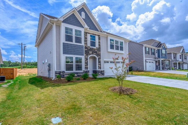 Photo - Elegant 4 Bedroom, 2 Bathroom Home with Modern Finishes & Open-Concept Living $2,150/mo rent