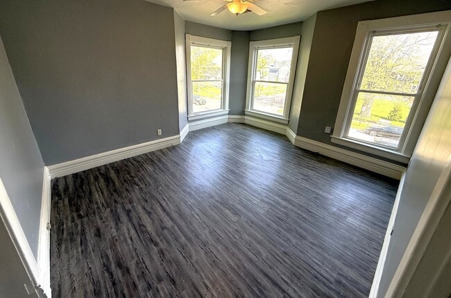 Giant living room with large windows! - 133 W 13th St Unit 3