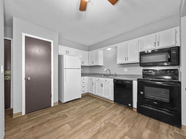 Kitchen - Trilein Village Apartments