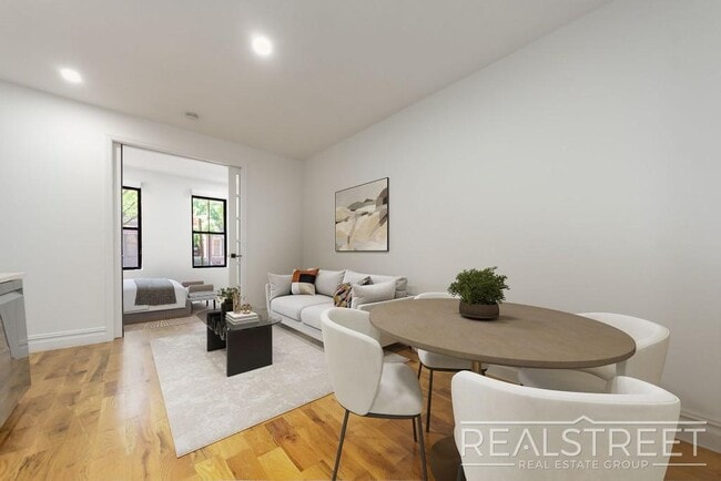 Photo - STUNNING 4+ BED 3 BATH DUPLEX + YARD IN PRIME BUSHWICK TOWNHOUSE Unit 1
