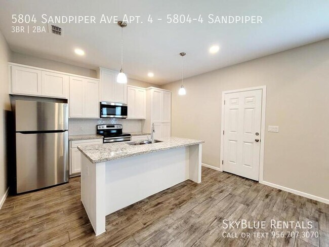 Photo - 5804 Sandpiper Ave Unidad 5804-4 Sandpiper