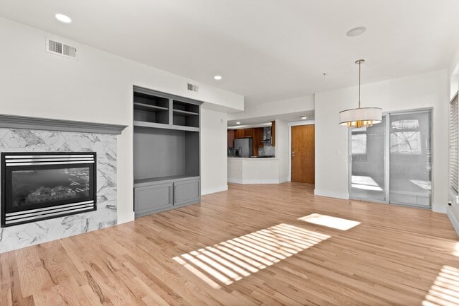 custom built in and gas fireplace - 1080 E 13th Ave Unit 301