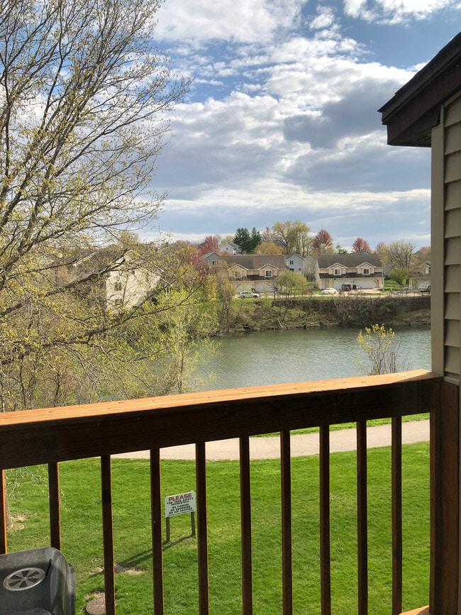 Deck overlooking a pond - 2601 Westwinds Dr Unit 4