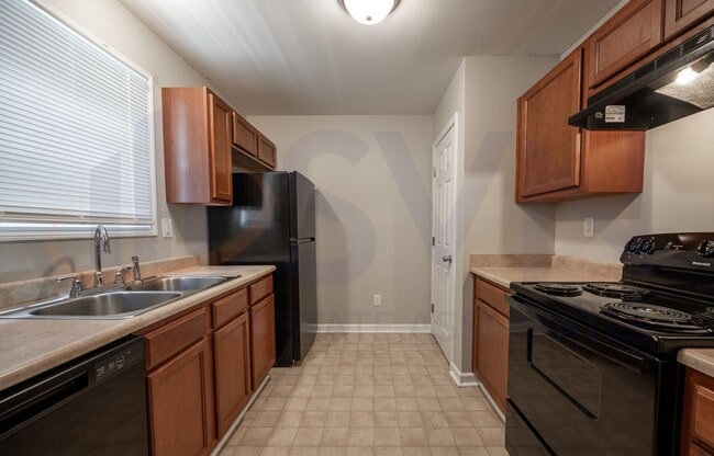 Building Photo - Welcome to this spacious 4-bedroom, 2.5-ba... Rental