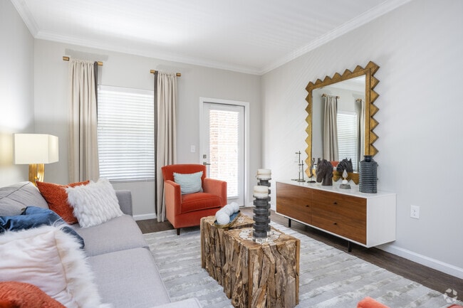 2 habitaciones, 2 baños - 1065 pies cuadrados - Sala de estar - Greymont Village Apartments