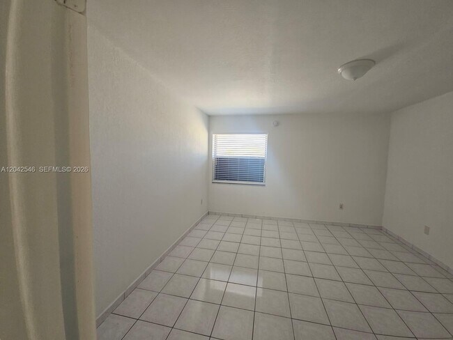 Photo - 1560 W 46th St Unit 244