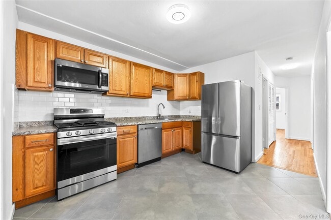 Building Photo - 200-04 39th Ave