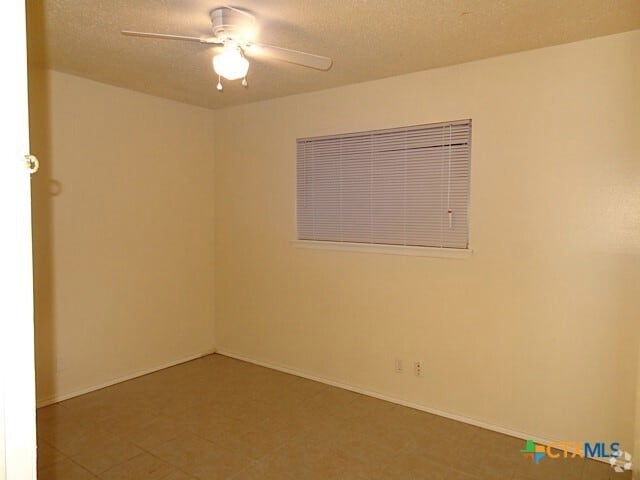 Building Photo - 1239 N LBJ Dr Unit B Rental