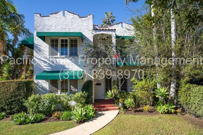 Building Photo - 8159 Willoughby Ave Unit 901