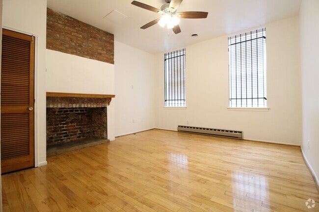 Building Photo - Beautiful 1 BR w/ Decorative Fireplace & M... Unit #A Rental