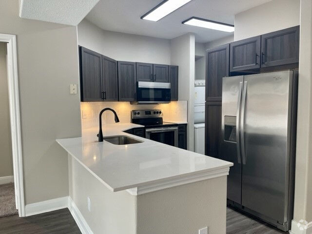 Building Photo - One Month Free – More Comfort, Less Cost Unit MS1 Rental