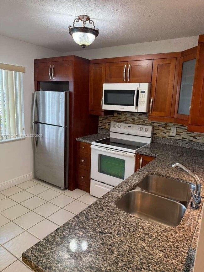 Building Photo - 8610 N Sherman Cir Unit 508
