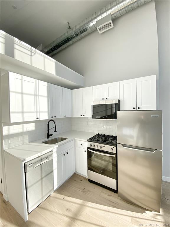 Building Photo - 32 Main St Unit 307