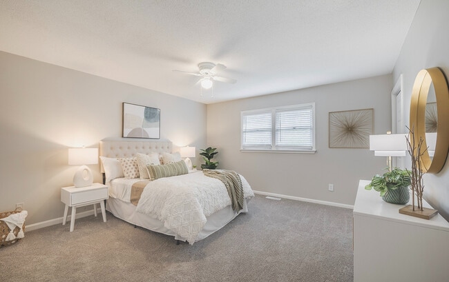 An oversized bedroom with flexible space for sleeping, working, or relaxing.