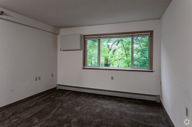 1BR, 1BA - 600SF - Living Room - Riverside Apartments 55+ Senior