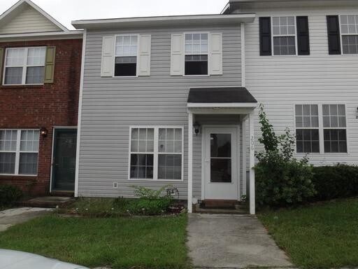Building Photo - Two Bedroom Townhome Unit .