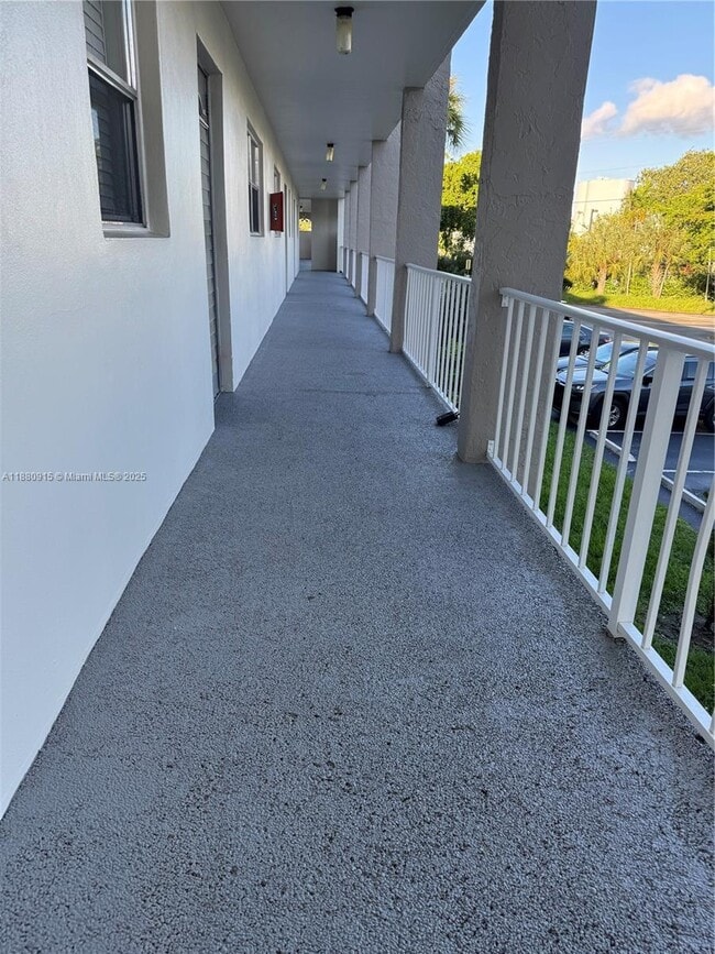 Building Photo - 8595 Sunrise Lakes Blvd Unit 312