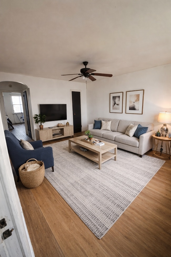 Living room furniture is not included - 6038 Baltimore Ave Unit 2F