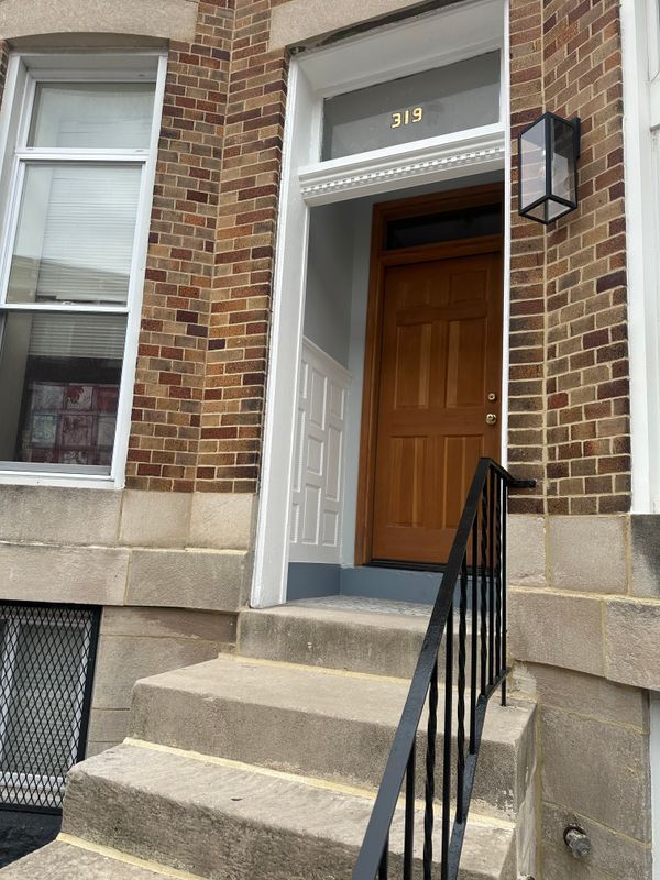Building Photo - 319 E 22nd St Unit 1