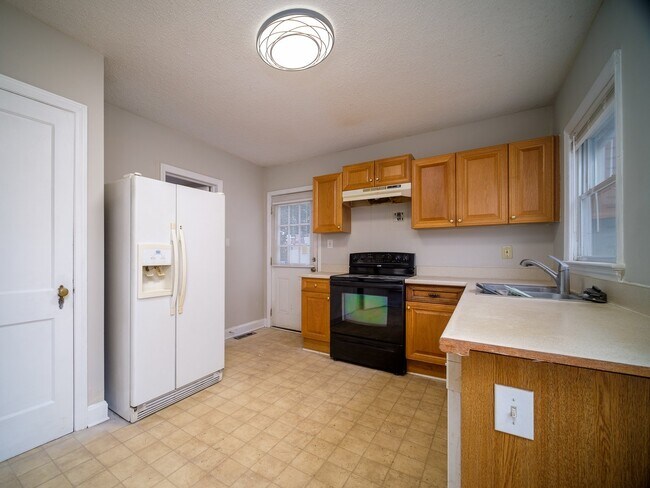 Photo - "Charming 3-Bedroom Home with Gleaming Hardwood Floors & 2 Full Baths in Prime Charlotte Location!"