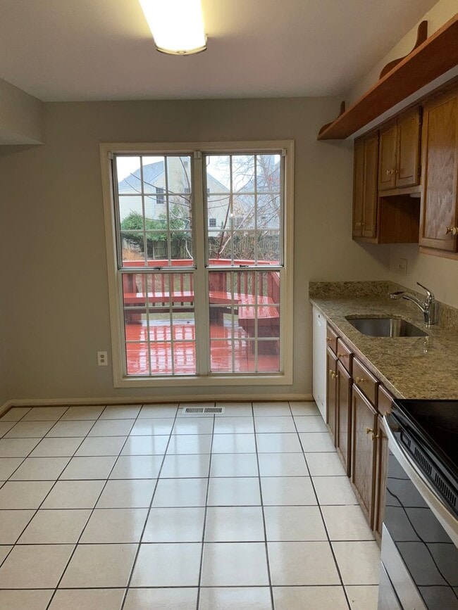 Photo - Very clean and well maintained 3BR 2.5BA single family home with large rear deck and 1 car garage