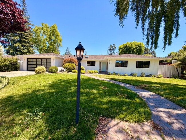 Building Photo - This premier 4-bed, 3-bath estate spans 2,565 sq. ft. on a 10,253 sq. ft. lot in North Los Altos.