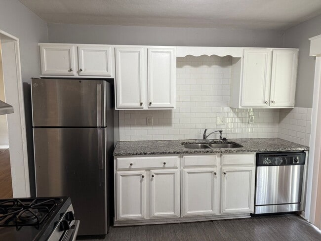 Building Photo - SEE IT NOW: Stylishly Updated Home in Inde...
