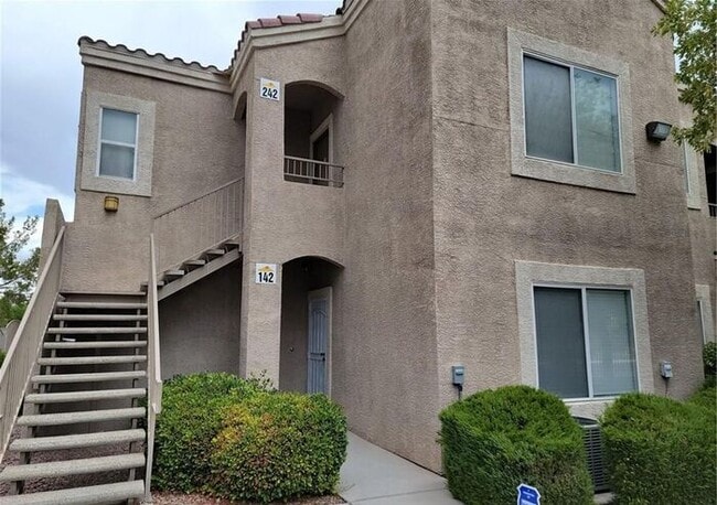 Building Photo - SPACIOUS FIRST-FLOOR CONDO LOCATED IN A GA...
