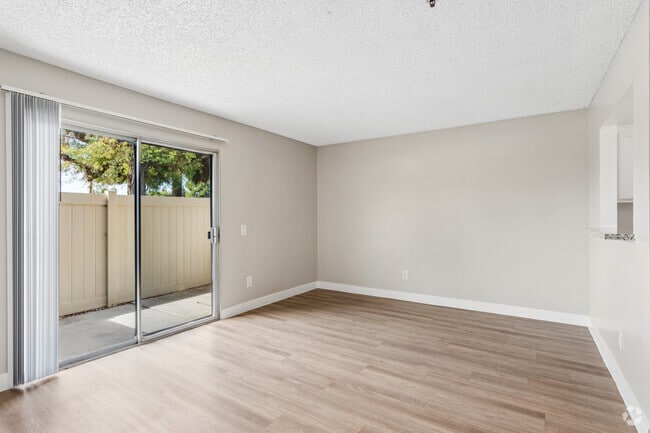 2BR, 1.5BA - 860SF - Living Room - Mountain Crest Townhomes