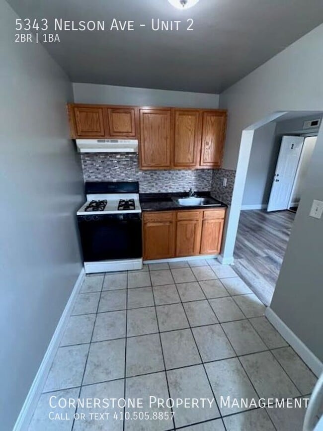 Building Photo - 5343 Nelson Ave Unit 2