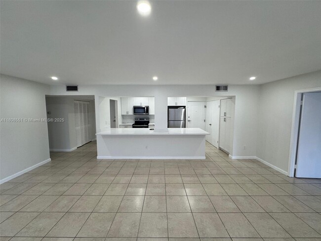 Photo - 7700 Camino Real Unidad D-311 Rental