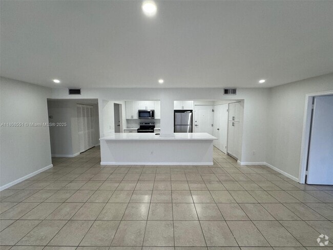 Building Photo - 7700 Camino Real Unit D-311 Rental
