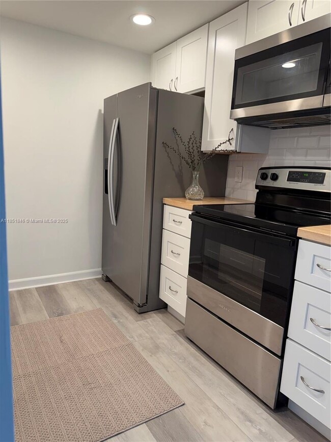 Building Photo - 801 SW 133rd Terrace Unit 310K