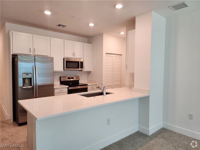Building Photo - 26401 Coco Cay Cir Unit 103 Rental