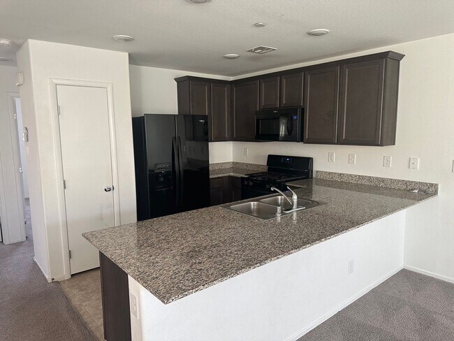 Photo - Townhouse with 2 car garage