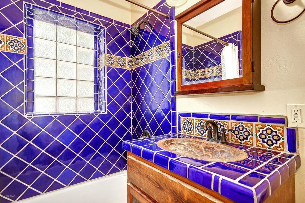 Lovely blue-tiled bathroom with shower/tub combo. - 2648 E Drachman St (Tucson, AZ)