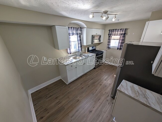 Photo - Updated 3-Bedroom Home with Private Upper Suite & Detached Garage
