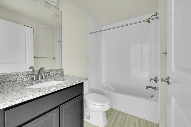 Photo - $2,199- 2 Bed, 2 Bath Ground Floor Condo with AC, and In Unit Laundry! Unit 108