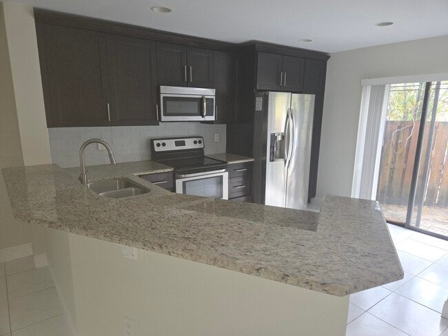 Building Photo - 7890 Lago Del Mar Dr