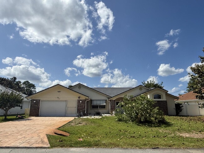 Building Photo - Spacious Pool Home in Desirable Palm Harbor – Pool Care Included