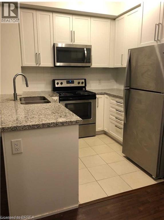 Photo - 840 Queens Plate Dr Unit 405